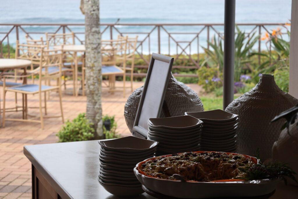 Buffet table with food and ocean view