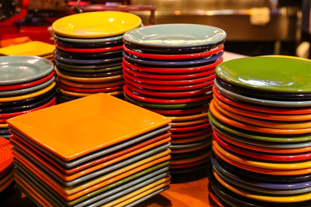 Yellow green red and blue ceramic bowls
