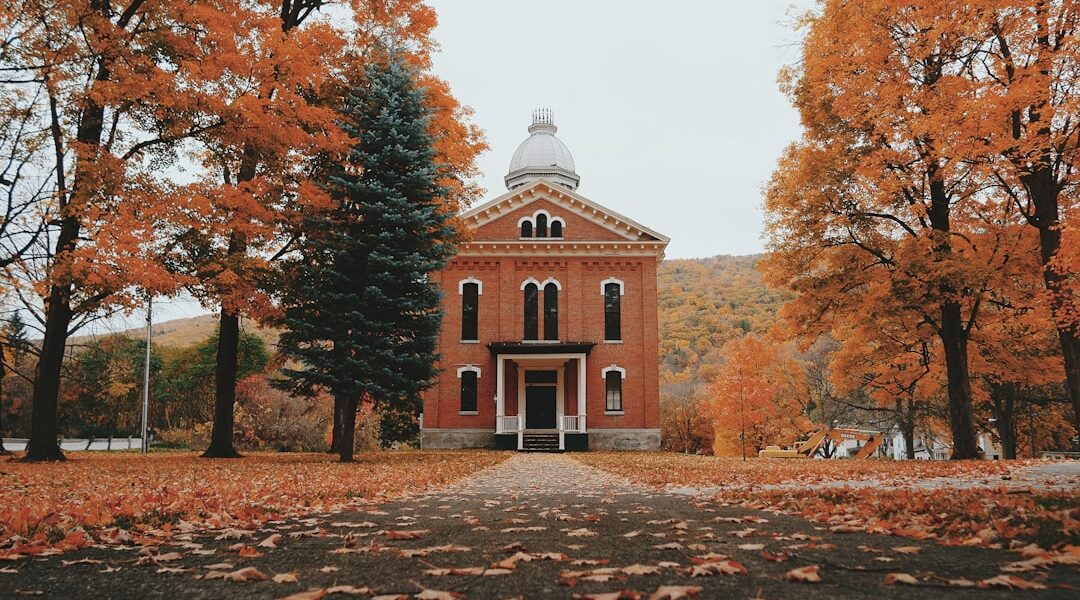 Brown and white concrete building surrounded by trees during daytime — Naples: Grape Pies, Bristol Mountain, and a Gorge Worth the Scramble