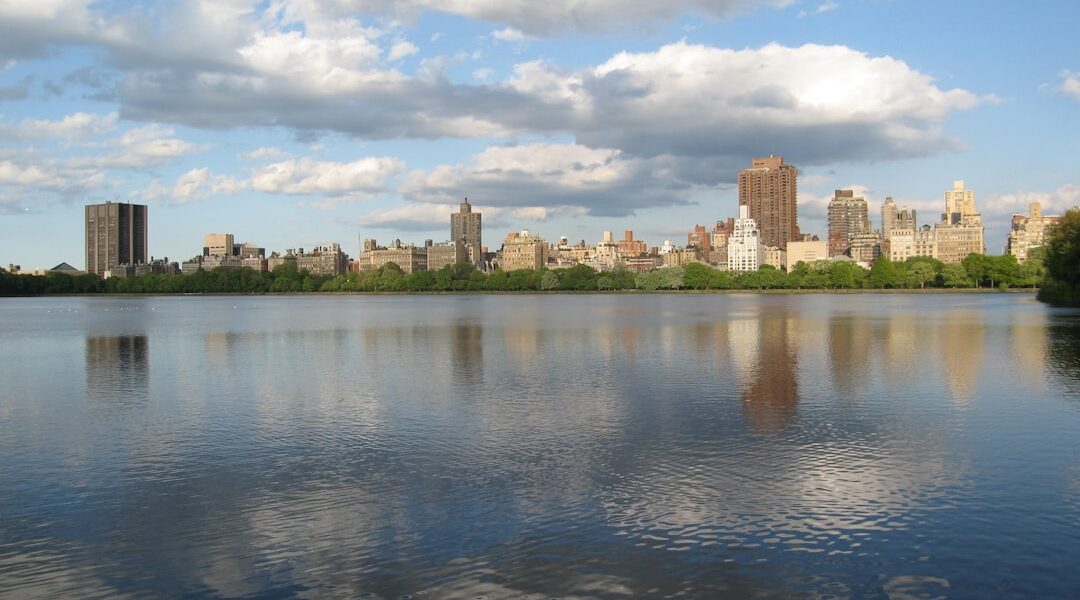 Cityscape at daytime beside body of water — The Complete Fishing Guide to the Finger Lakes