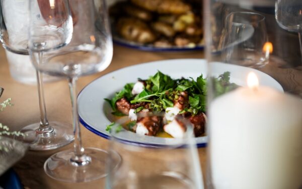 Cooked food on plate on wooden table — Kindred Fare