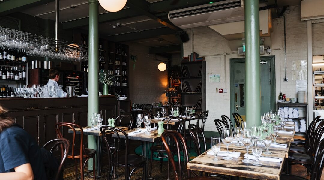 Restaurant interior with tables and bar area. — New York Kitchen