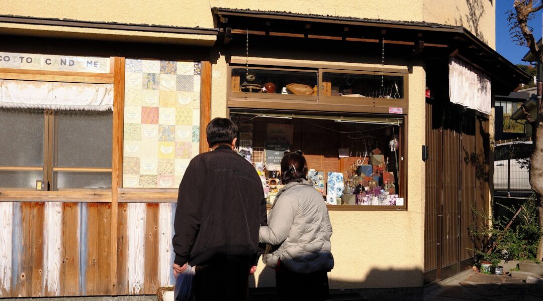 Two people look into a shop window — Harriet Tubman National Historical Park