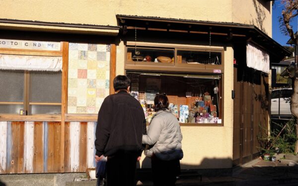 Two people look into a shop window — Harriet Tubman National Historical Park
