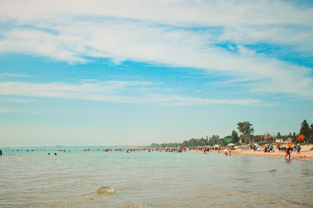 A beach with a lot of people on it
